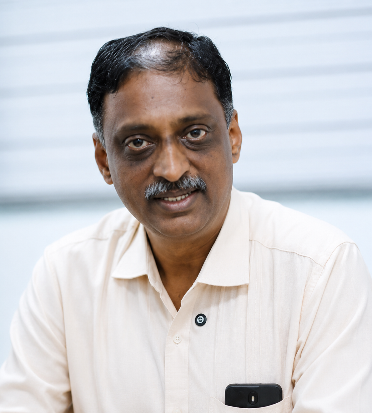 Mr. Vinod Thomas